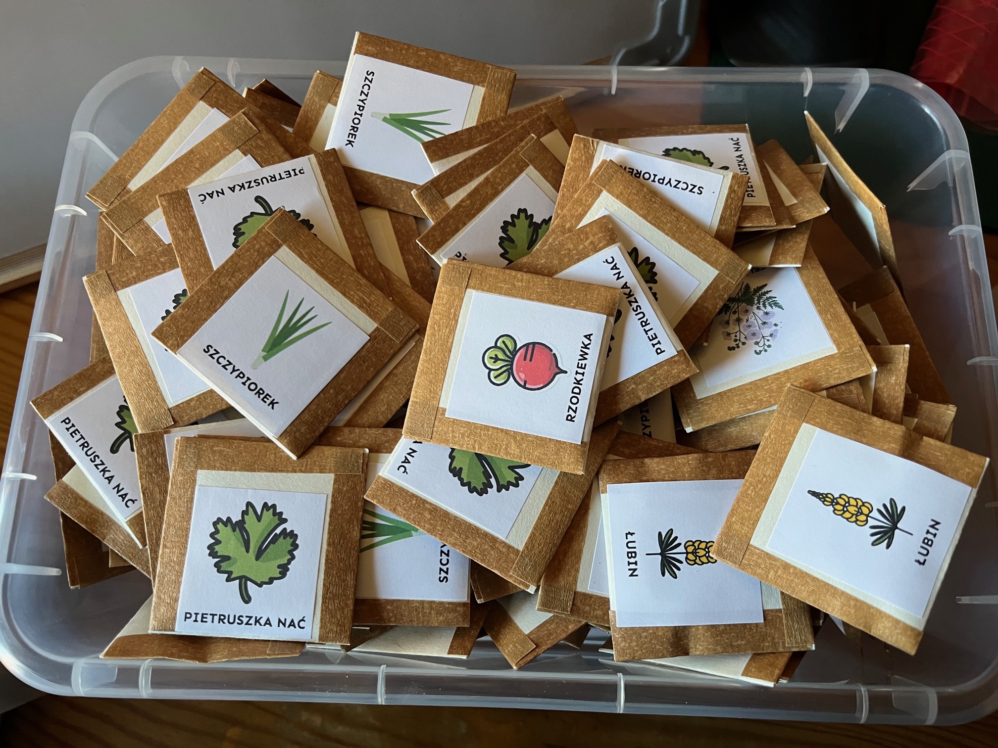 Seed packages in a larger container.