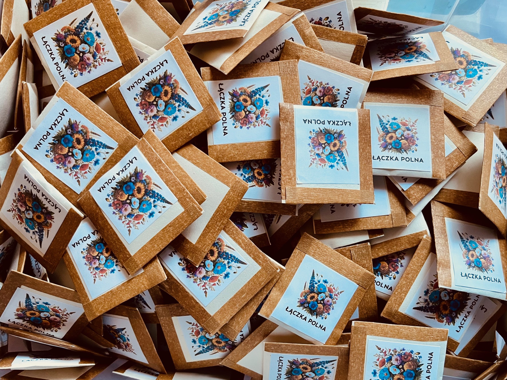 Seed packages in a larger container.