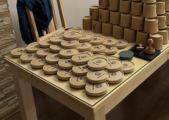 Picture of a lot of paper lids.